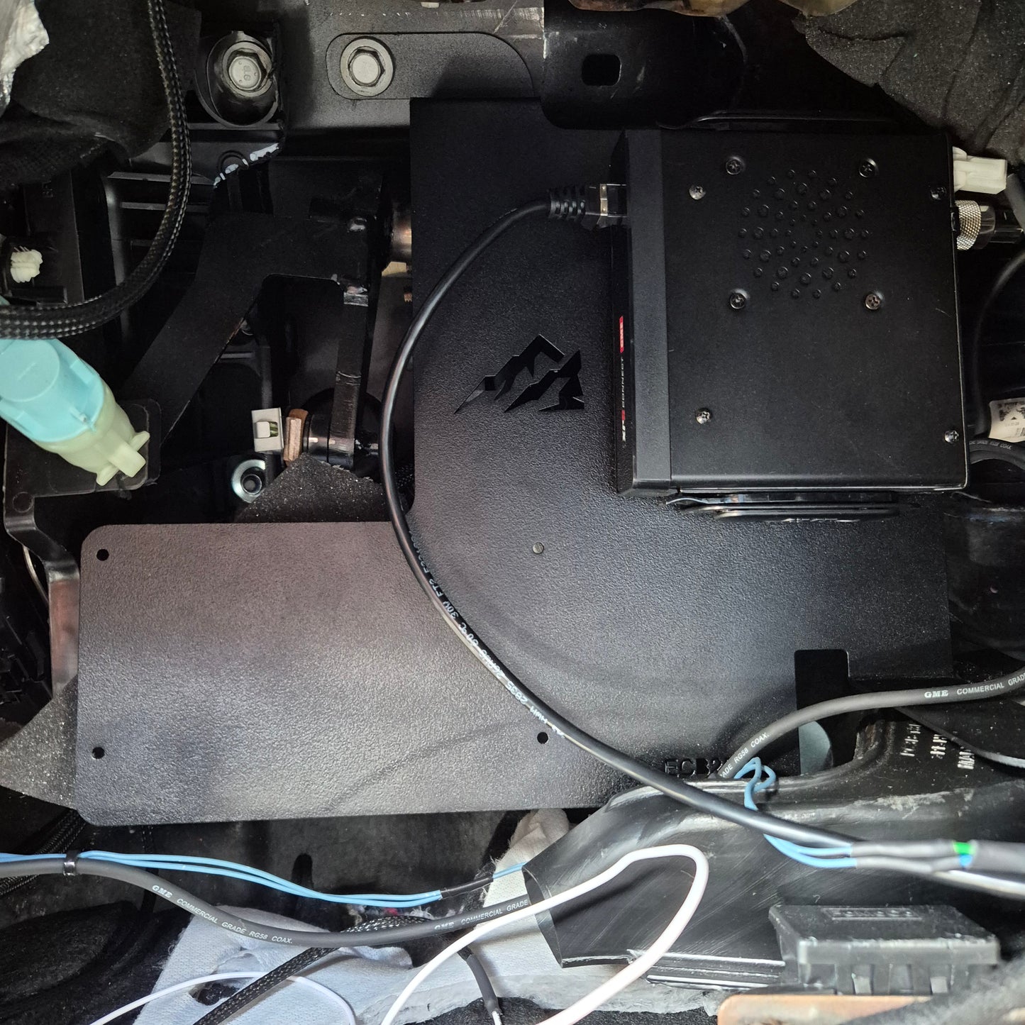 F-350 behind glovebox UHF mount